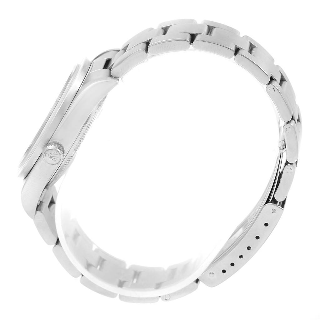 The image shows a side view of a Rolex Air-King 14010 Men's Stainless Steel Black Dial 14010 Men's Stainless Steel Black Dial watch focusing on its case, crown, and bracelet with clasp.