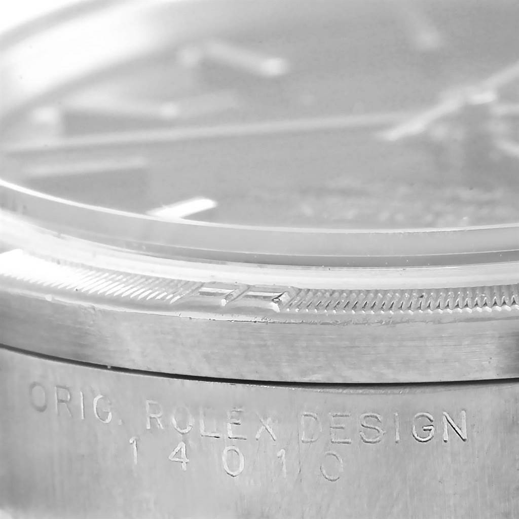The image shows a close-up of the bezel and side casing of a Rolex Air-King 14010 Men's Stainless Steel Black Dial 14010 Men's Stainless Steel Black Dial watch, displaying the "Orig. Rolex Design" engraving.