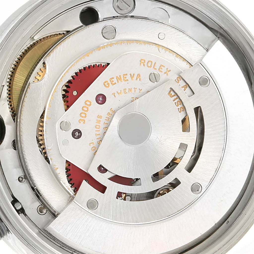 This close-up image shows the intricate internal mechanism of a Rolex Air-King 14010 Men's Stainless Steel Black Dial 14010 Men's Stainless Steel Black Dial watch, emphasizing gears and the rotor.
