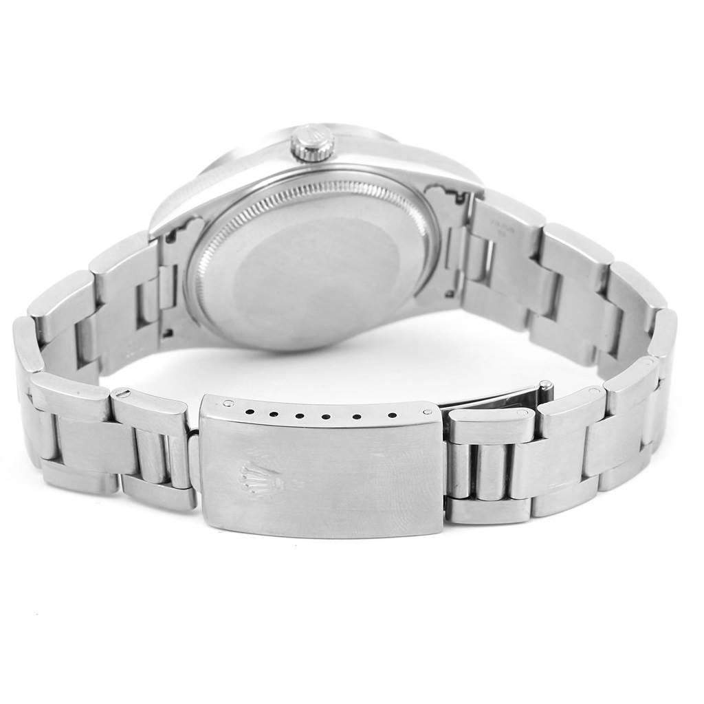 The image shows the back view of the Rolex Air-King 14010 Men's Stainless Steel Black Dial 14010 Men's Stainless Steel Black Dial watch, including its case back and metal bracelet clasp.