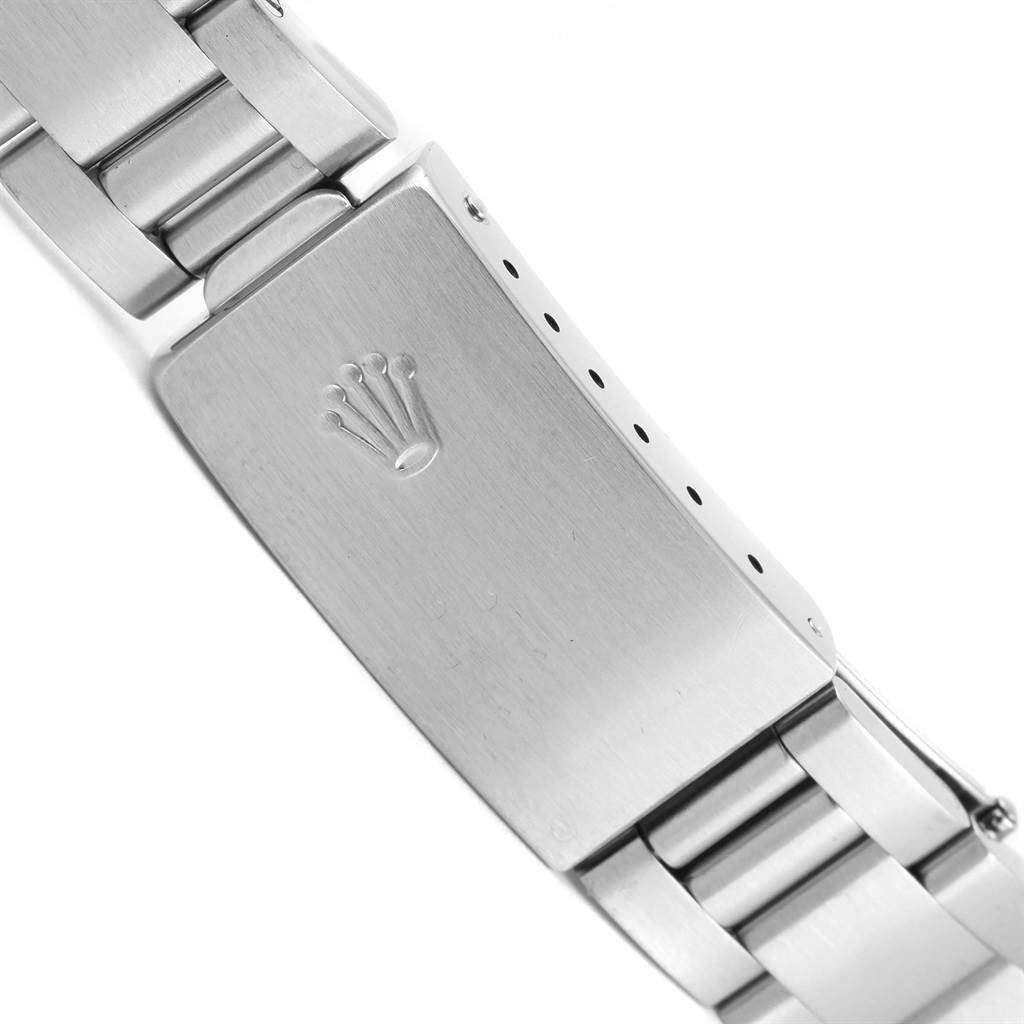 This image shows the clasp of a Rolex Air-King 14000 Men's Stainless Steel Black Dial 14000 Men's Stainless Steel Black Dial watch bracelet from a side angle.