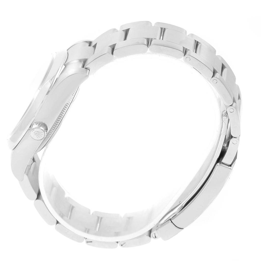 This image shows a side view of the Rolex Air-King 114200 Men's Stainless Steel Blue Dial 114200 Men's Stainless Steel Blue Dial watch, highlighting the bracelet and part of the case.