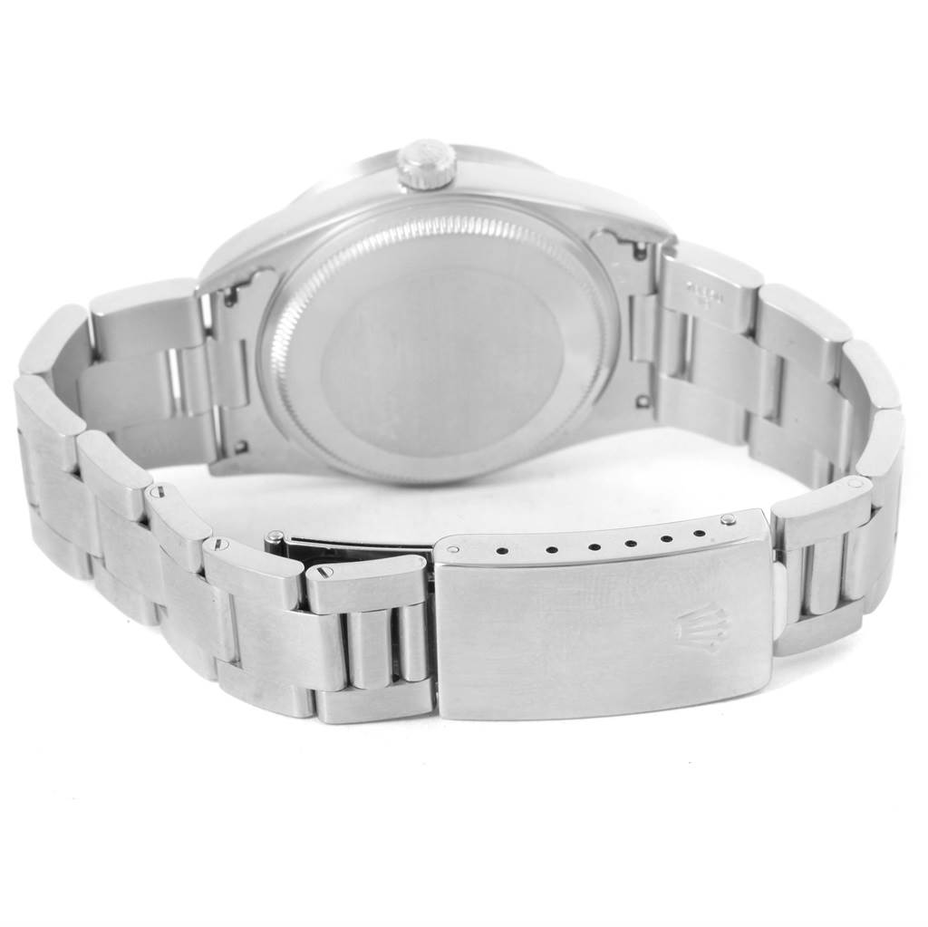 The image shows the back view of a Rolex Air-King 14010 Men's Stainless Steel Silver Dial 14010 Men's Stainless Steel Silver Dial watch, detailing the bracelet, clasp, and case back.