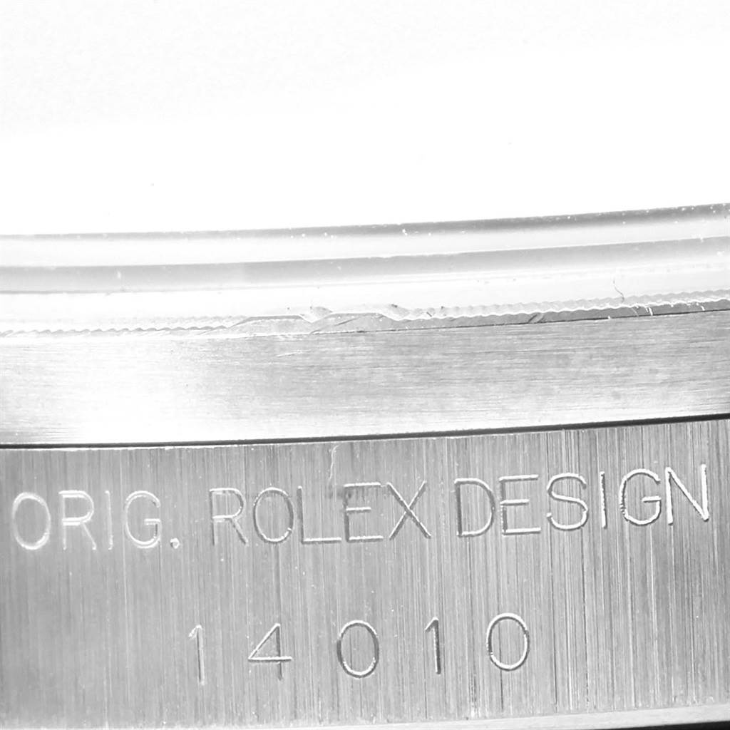 The image shows a close-up of the case side of a Rolex Air-King 14010 Men's Stainless Steel Blue Dial 14010 Men's Stainless Steel Blue Dial watch, displaying the engraved text "ORIG. ROLEX DESIGN" and the model number "14010".