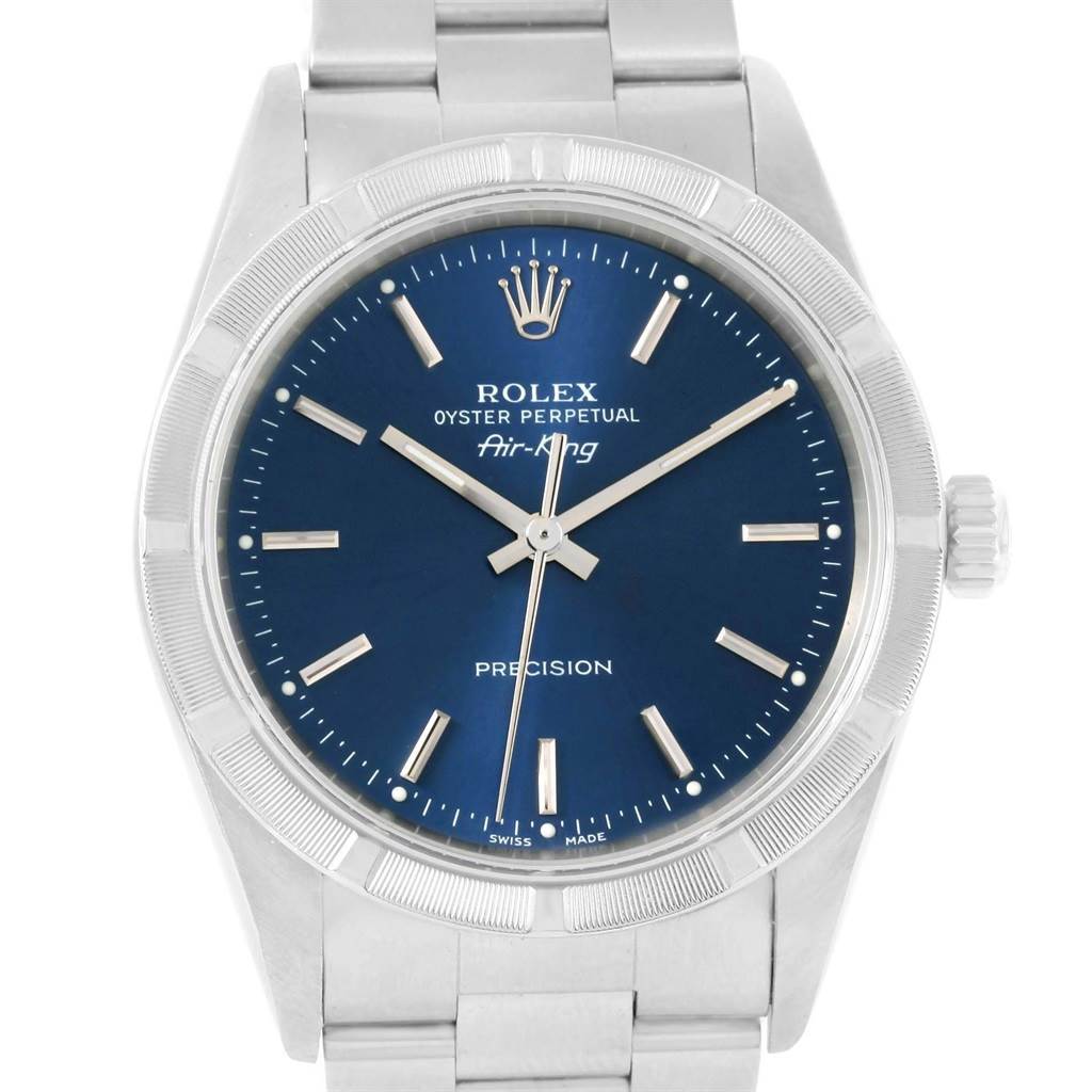 The Rolex Air-King 14010 Men's Stainless Steel Blue Dial 14010 Men's Stainless Steel Blue Dial watch is shown from a front angle, highlighting its blue dial and silver bracelet.