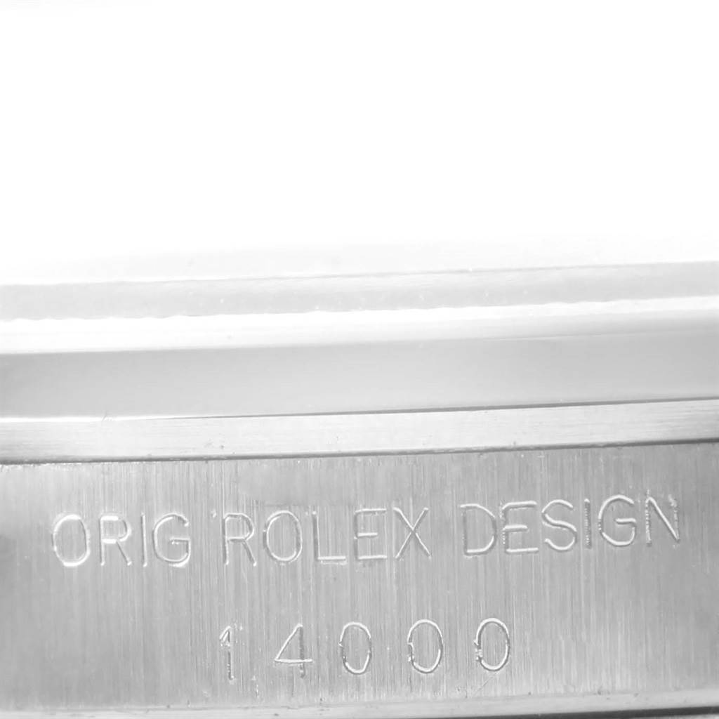 This image shows a close-up of the engraved casing on a Rolex Air-King 14000 Men's Stainless Steel Silver Dial 14000 Men's Stainless Steel Silver Dial watch, displaying the lettering "ORIG ROLEX DESIGN" and the model number "14000".