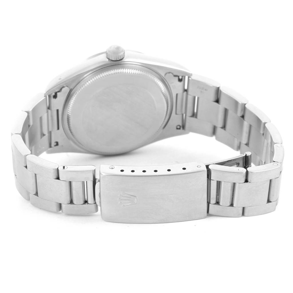 This image shows the back case and bracelet clasp of a Rolex Air-King 14000 Men's Stainless Steel Black Dial 14000 Men's Stainless Steel Black Dial watch.