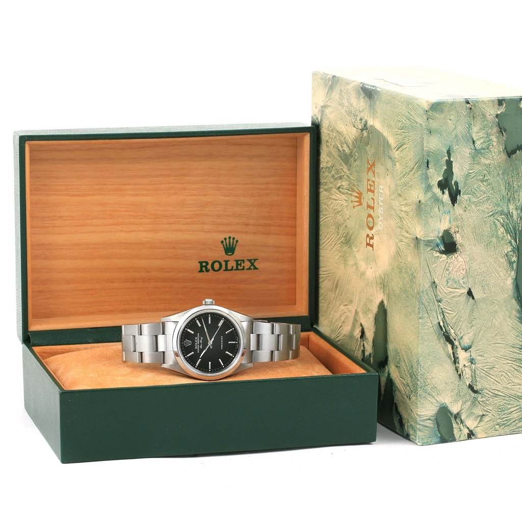 The Rolex Air-King 14000 Men's Stainless Steel Black Dial 14000 Men's Stainless Steel Black Dial watch is displayed front-facing inside its open box, with the outer box positioned to the right.
