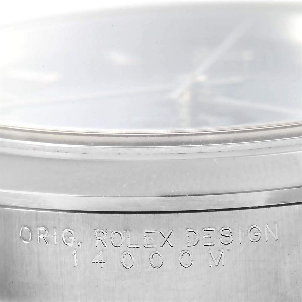 The image shows a close-up of the side of a Rolex Air-King 14000 Men's Stainless Steel Blue Dial 14000 Men's Stainless Steel Blue Dial watch case, with the model number engraved on it.