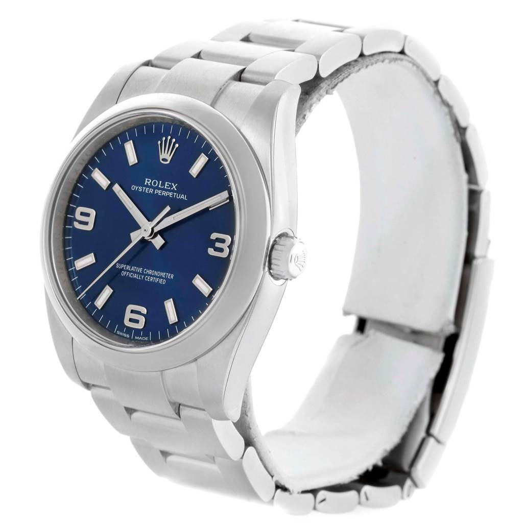 The image shows a side view angle of a Rolex Air-King 114200 Men's Stainless Steel Blue Dial 114200 Men's Stainless Steel Blue Dial watch, highlighting its blue dial, stainless steel case, and bracelet.