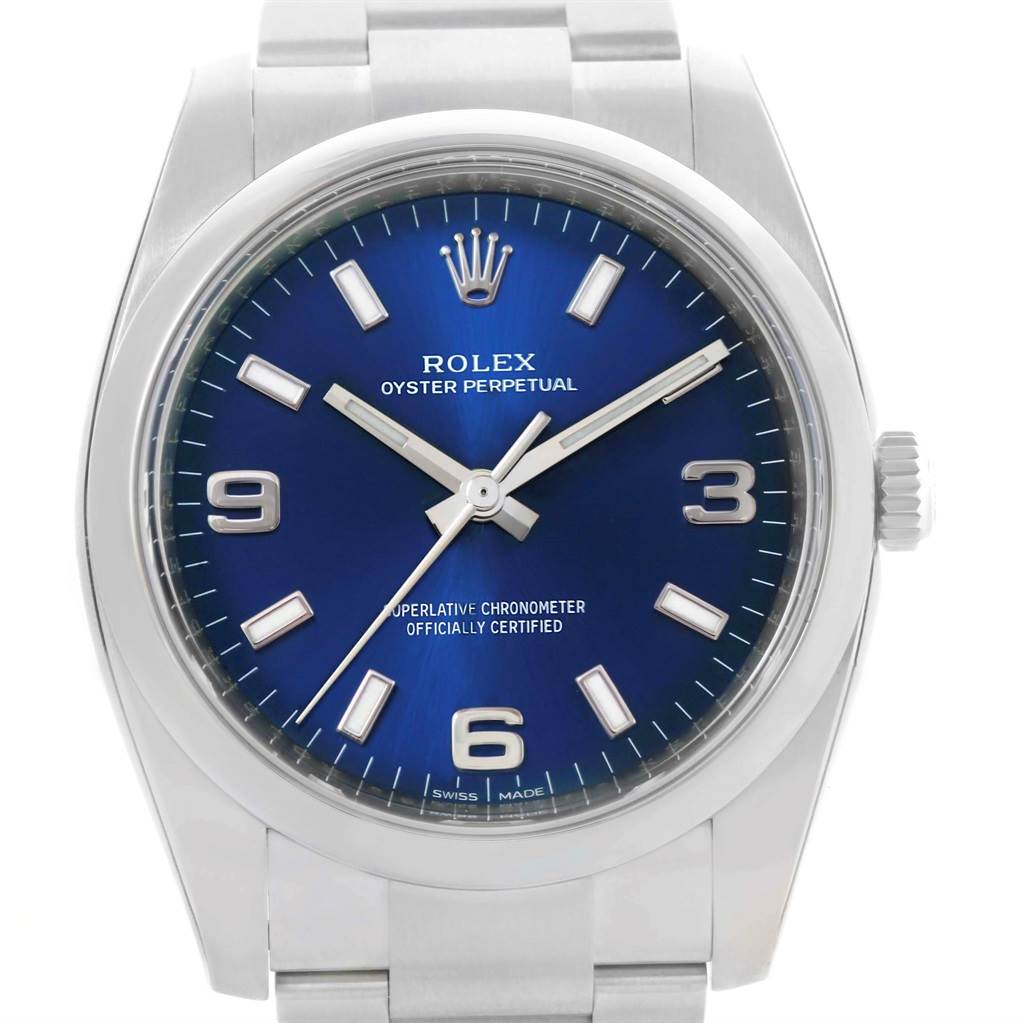 This Rolex Air-King 114200 Men's Stainless Steel Blue Dial 114200 Men's Stainless Steel Blue Dial model is shown from a front angle, highlighting its blue dial, hour markers, and stainless steel case and bracelet.