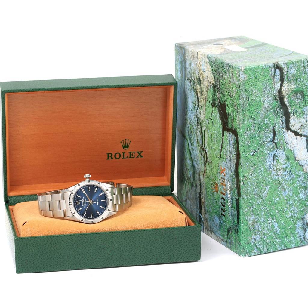 The image shows a Rolex Air-King 14010 Men's Stainless Steel Blue Dial 14010 Men's Stainless Steel Blue Dial watch in an open green and wooden Rolex box, with an outer green decorative box beside it.