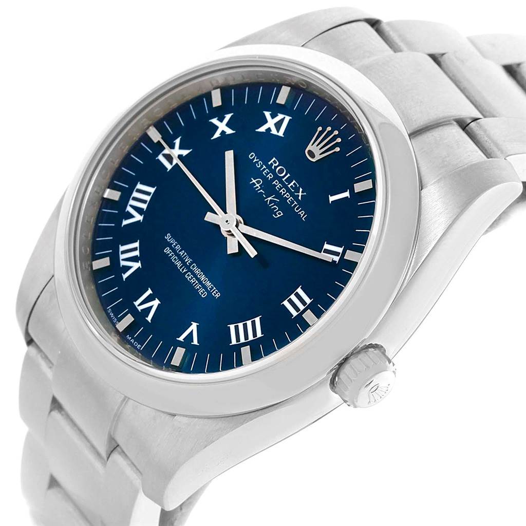 This image shows the Rolex Air-King 114200 Men's Stainless Steel Blue Dial 114200 Men's Stainless Steel Blue Dial watch at an angle highlighting the blue dial, Roman numerals, and silver bracelet.