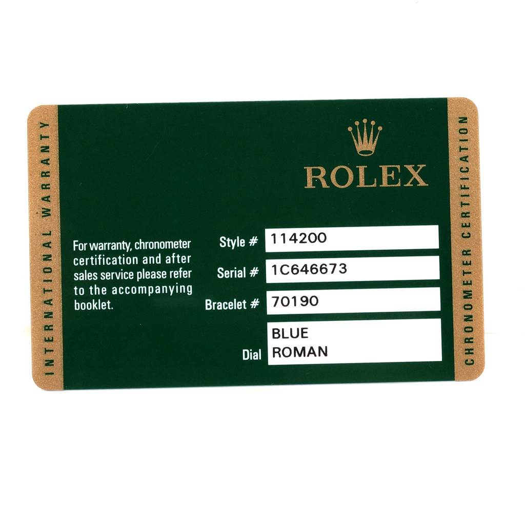 This image shows a warranty card for the Rolex Air-King 114200 Men's Stainless Steel Blue Dial 114200 Men's Stainless Steel Blue Dial, detailing style, serial, and bracelet numbers along with dial information.