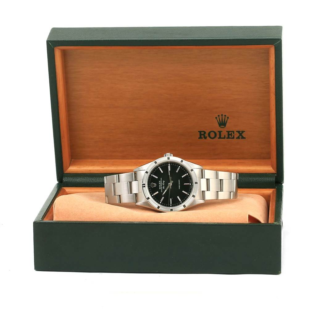 The Rolex Air-King 14010 Men's Stainless Steel Black Dial 14010 Men's Stainless Steel Black Dial watch is displayed in its open box, showing the face and metal bracelet from a front angle.