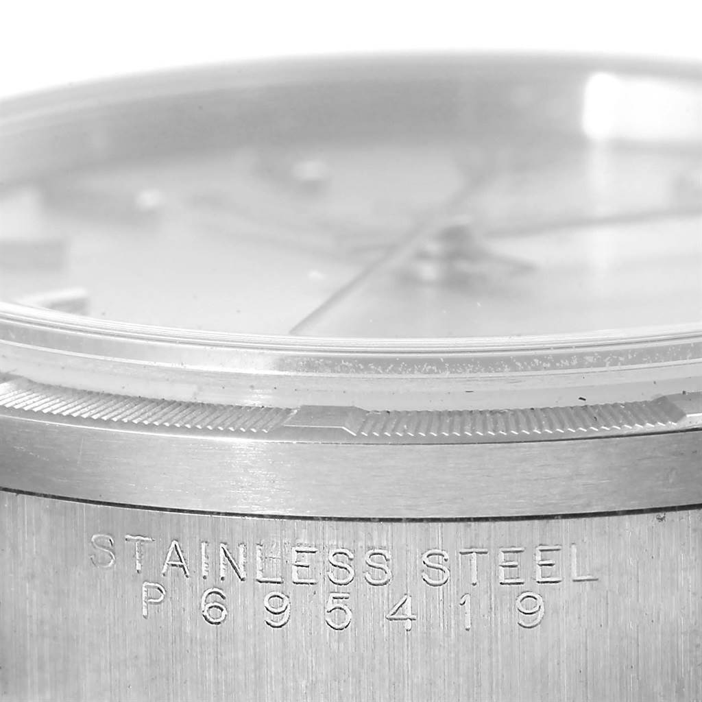Close-up, side-angle view of a Rolex Air-King 14010 Men's Stainless Steel Silver Dial 14010 Men's Stainless Steel Silver Dial showing stainless steel body and partial face.