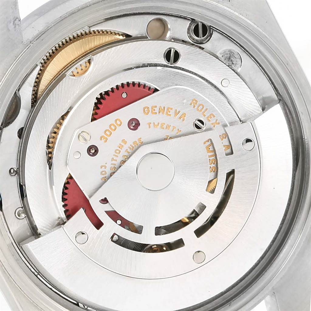 This image shows a close-up of the movement and inner mechanisms of a Rolex Air-King 14010 Men's Stainless Steel Silver Dial 14010 Men's Stainless Steel Silver Dial watch.