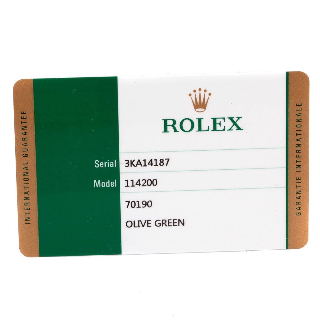 This is an international guarantee card for the Rolex Air-King 114200 Men's Stainless Steel Green Dial 114200 Men's Stainless Steel Green Dial model 114200 in olive green.