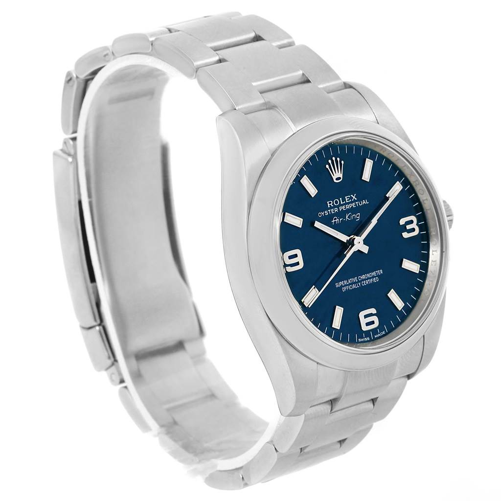 The Rolex Air-King 114200 Men's Stainless Steel Blue Dial 114200 Men's Stainless Steel Blue Dial watch is shown at a slight side angle, displaying its dial, case, and partially open stainless steel bracelet.