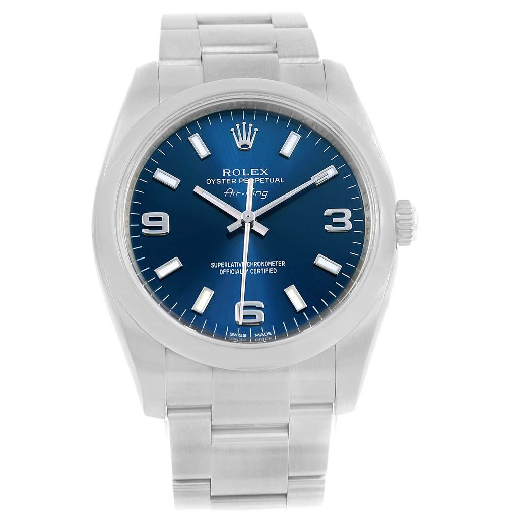 The Rolex Air-King 114200 Men's Stainless Steel Blue Dial 114200 Men's Stainless Steel Blue Dial watch is shown from a straight-on angle, displaying its blue dial, silver indices, and silver bracelet.