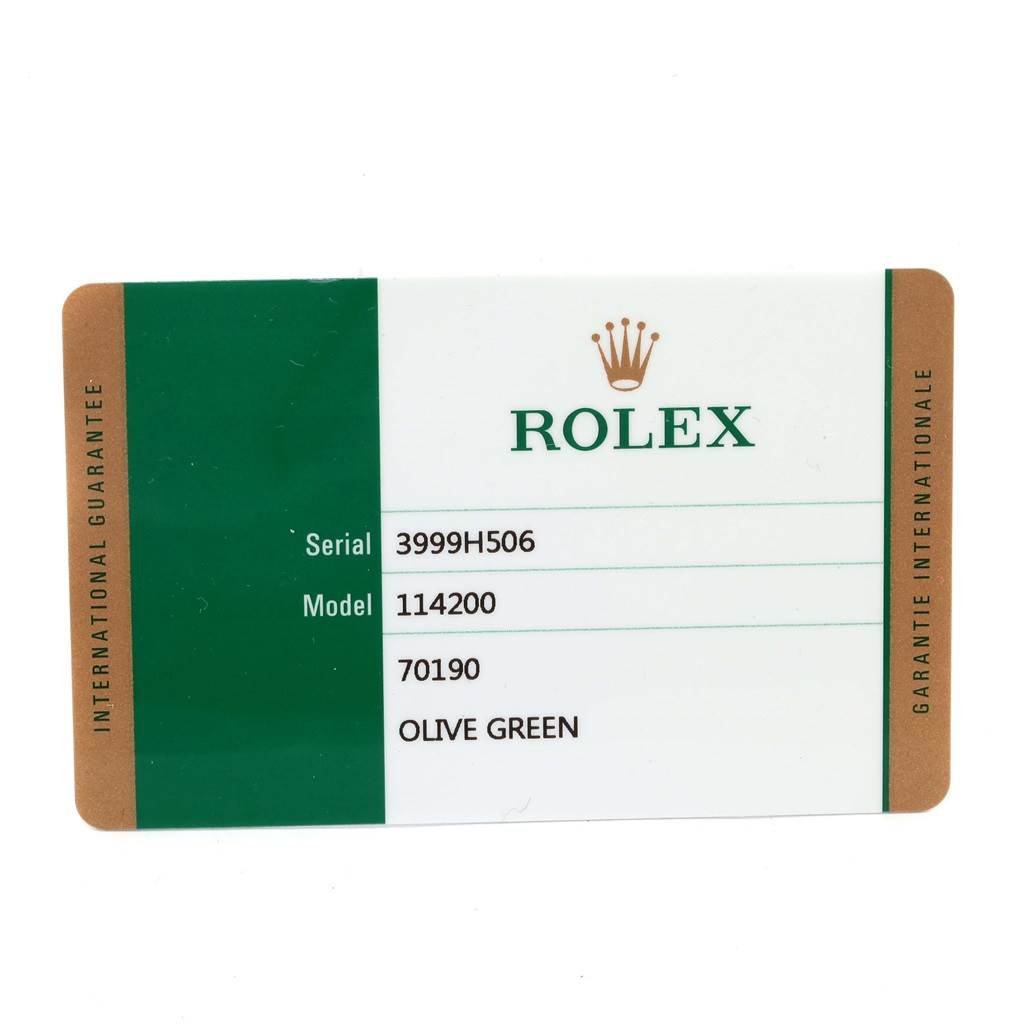The image shows an international guarantee card for the Rolex Air-King 114200 Men's Stainless Steel Green Dial 114200 Men's Stainless Steel Green Dial model.