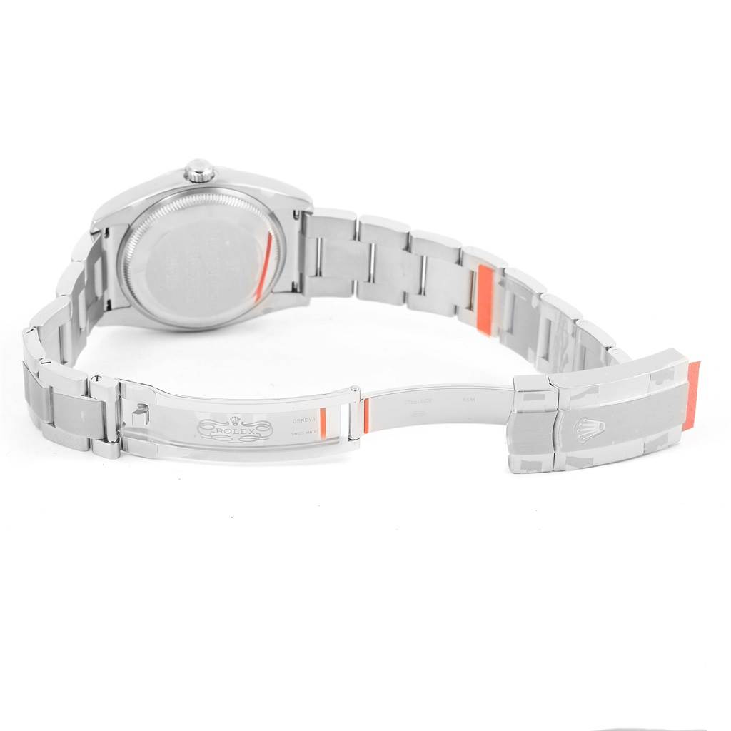 This image shows the open back and clasp of a Rolex Air-King 114200 Men's Stainless Steel Green Dial 114200 Men's Stainless Steel Green Dial watch, highlighting its bracelet and underside details.