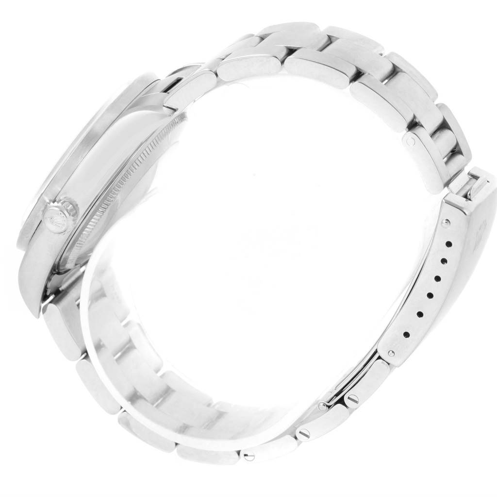 The image shows a side view of a Rolex Air-King 14010 Men's Stainless Steel Silver Dial 14010 Men's Stainless Steel Silver Dial watch, featuring its case and bracelet.