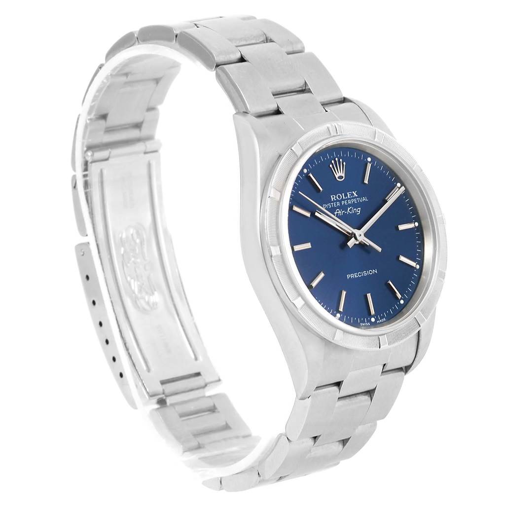 The image shows a side angle of a Rolex Air-King 14010 Men's Stainless Steel Blue Dial 14010 Men's Stainless Steel Blue Dial watch, highlighting its dial, case, and metal bracelet.