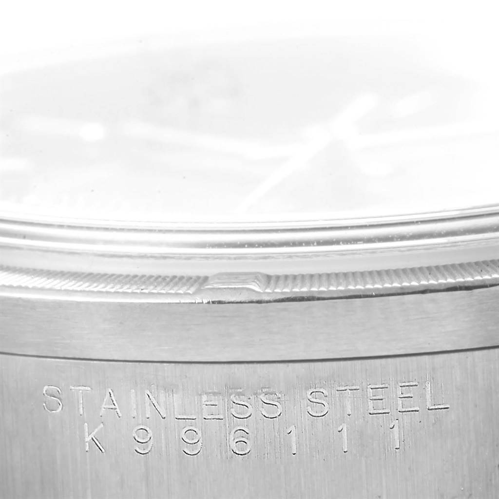 The image shows a close-up of the stainless steel case back of a Rolex Air-King 14010 Men's Stainless Steel Blue Dial 14010 Men's Stainless Steel Blue Dial watch, highlighting the model number engraving.