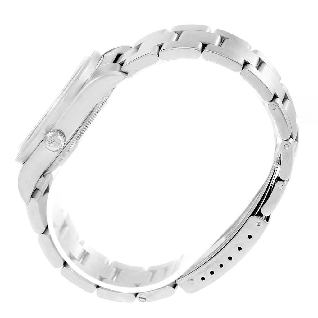 The image shows a side view of a Rolex Air-King 14010 Men's Stainless Steel Blue Dial 14010 Men's Stainless Steel Blue Dial watch, highlighting the bracelet and crown.