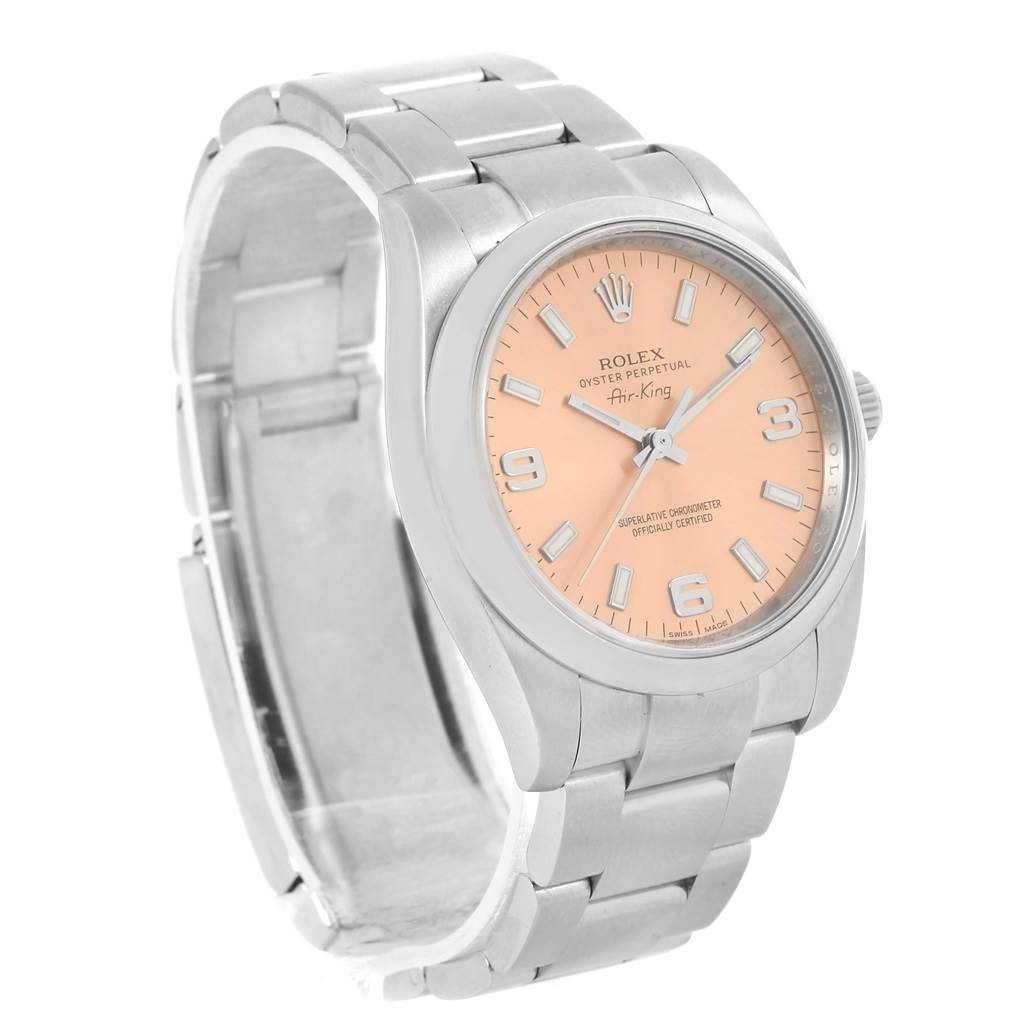 The image shows a Rolex Air-King 114200 Men's Stainless Steel Pink Dial 114200 Men's Stainless Steel Pink Dial watch at a 3/4 angle, highlighting the watch face, bezel, and metal bracelet.