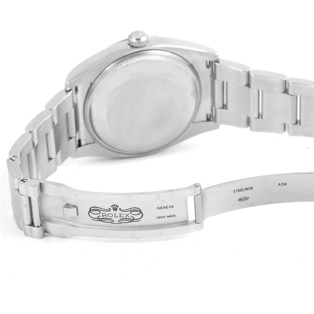 The image shows the back case and open clasp of a Rolex Air-King 114200 Men's Stainless Steel Pink Dial 114200 Men's Stainless Steel Pink Dial watch, displaying the bracelet and branded inside clasp.