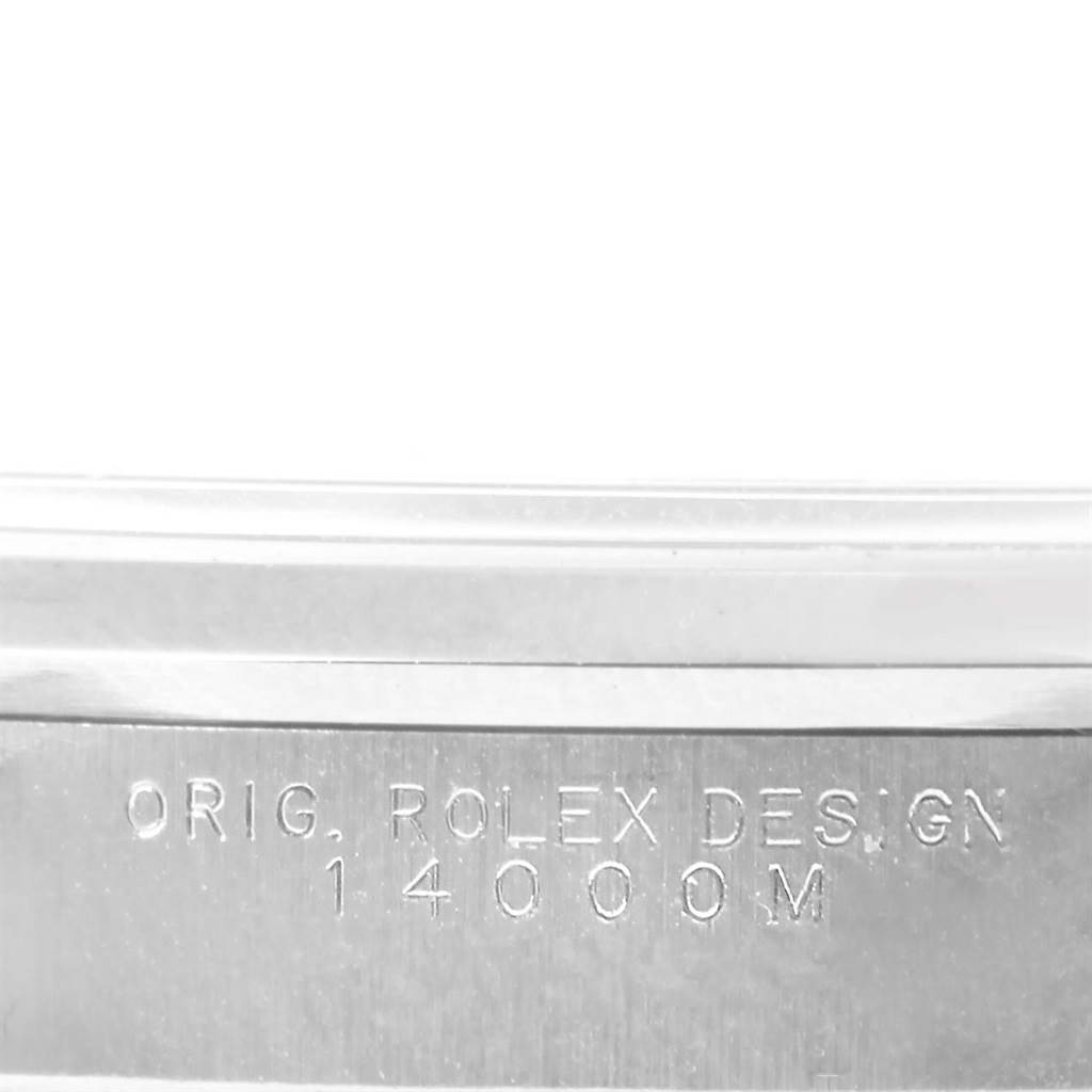 The image shows a close-up of the case side of a Rolex Air-King 14000 Men's Stainless Steel Blue Dial 14000 Men's Stainless Steel Blue Dial, displaying engraved text "ORIG. ROLEX DESIGN 14000M."