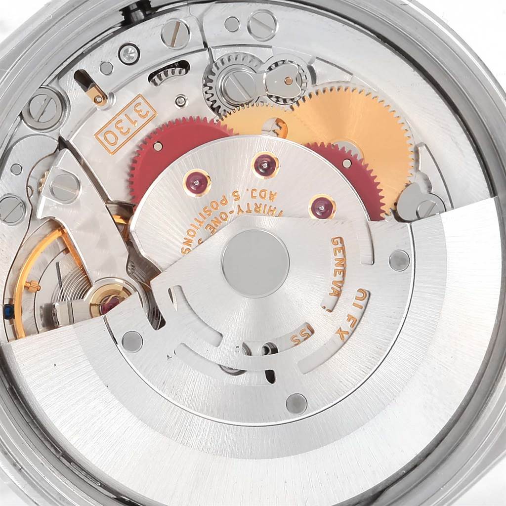 The image shows the internal mechanical movement of the Rolex Air-King 14000 Men's Stainless Steel Blue Dial 14000 Men's Stainless Steel Blue Dial watch, highlighting gears and intricate components.