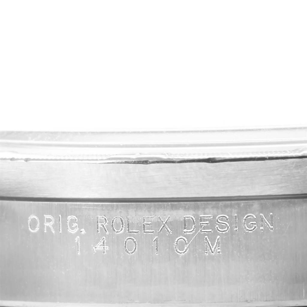 This close-up image shows the engraved case side of a Rolex Air-King 14010 Men's Stainless Steel Silver Dial 14010 Men's Stainless Steel Silver Dial model.