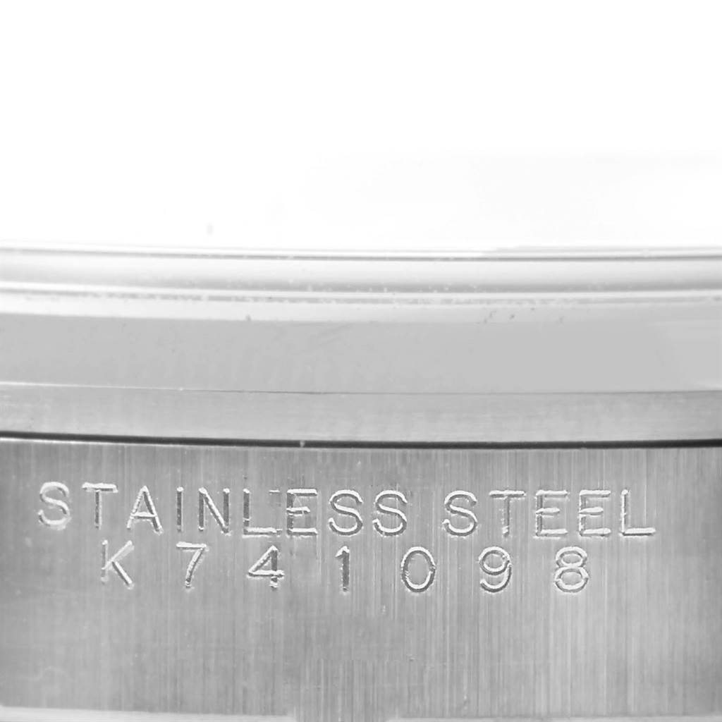 This image shows a close-up of the stainless steel caseback, engraved with "STAINLESS STEEL K741098," from a Rolex Air-King 14000 Stainless Steel Pink Dial 14000 Stainless Steel Pink Dial watch.