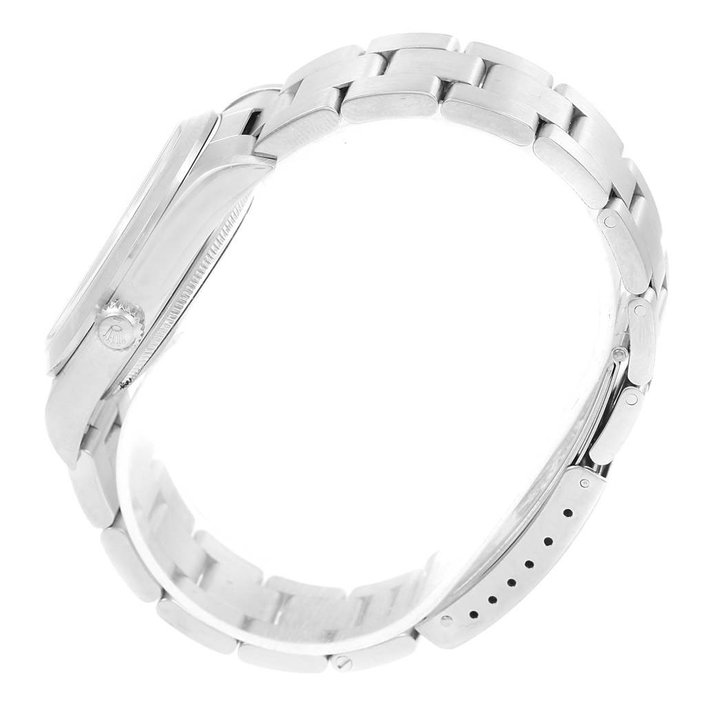 The image shows a side view of a Rolex Air-King 14000 Stainless Steel Pink Dial 14000 Stainless Steel Pink Dial watch, highlighting the bracelet and part of the case.