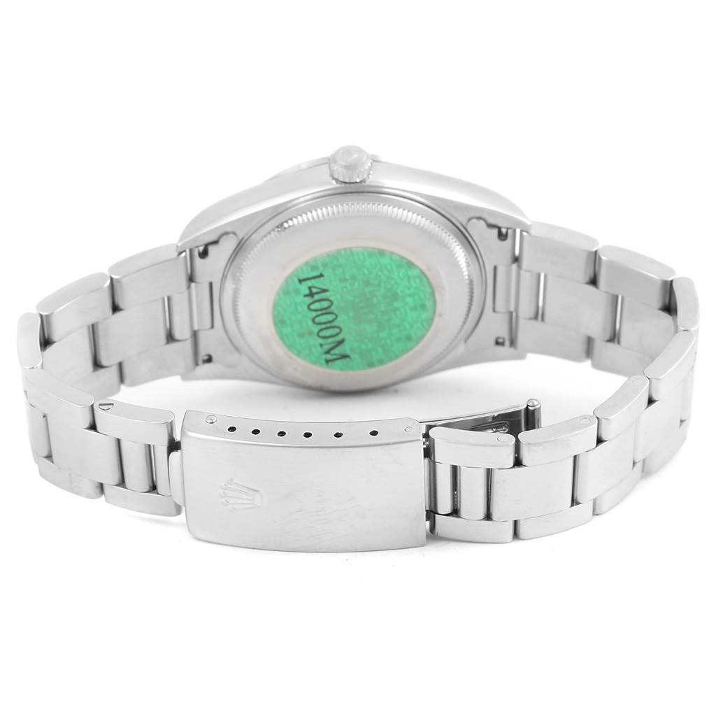 The image shows the back view of a Rolex Air-King 14000 Stainless Steel Pink Dial 14000 Stainless Steel Pink Dial watch, highlighting its case back, bracelet, and clasp.