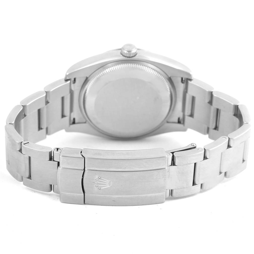 The image shows the back view of a Rolex Air-King 114200 Men's Stainless Steel Silver Dial 114200 Men's Stainless Steel Silver Dial watch, highlighting the clasp, bracelet, and case back.