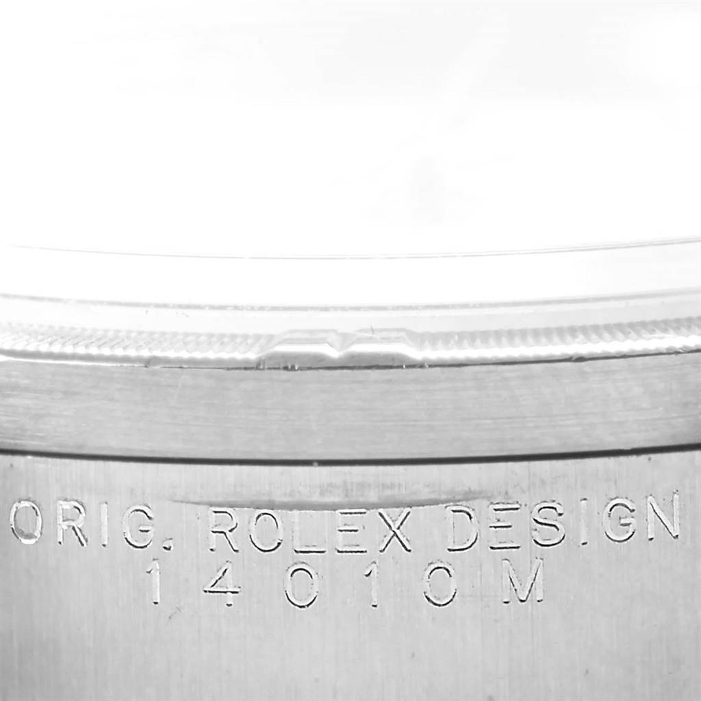 The image shows a close-up of the bezel and engraved serial number "14010M" on a Rolex Air-King 14010 Men's Stainless Steel Silver Dial 14010 Men's Stainless Steel Silver Dial watch.