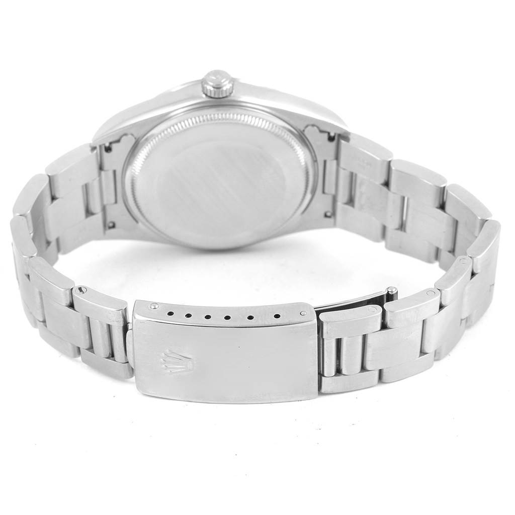 The image shows the back and bracelet clasp of the Rolex Air-King 14000 Men's Stainless Steel Blue Dial 14000 Men's Stainless Steel Blue Dial watch, displaying the closed case back and stainless steel bracelet.