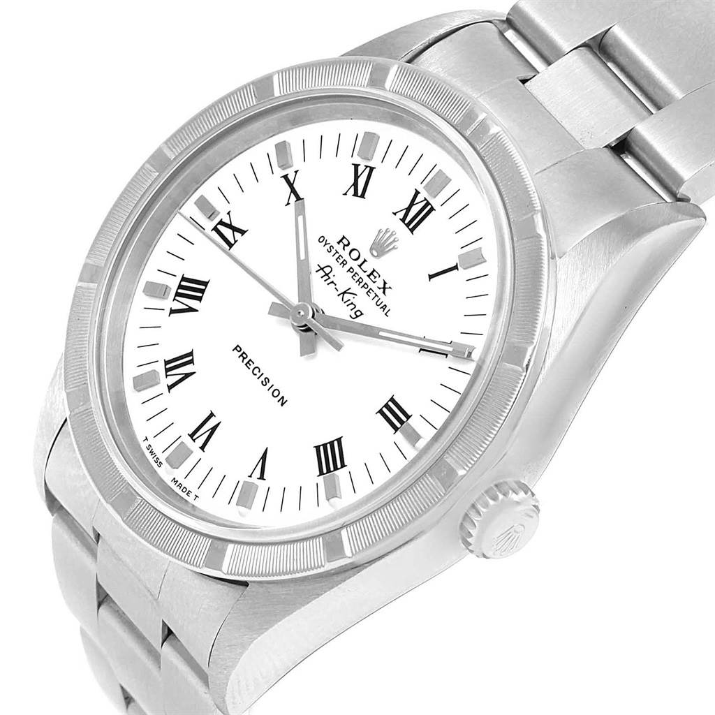 The image shows a close-up, angled view of a Rolex Air-King 14010 Men's Stainless Steel White Dial 14010 Men's Stainless Steel White Dial watch face with Roman numerals and part of its metal band.