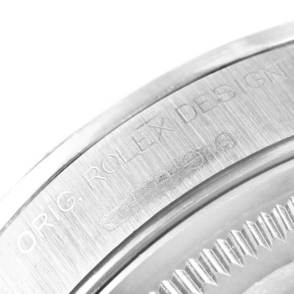 The image shows a close-up of the case back edge of a Rolex Air-King 14000 Men's Stainless Steel Silver Dial 14000 Men's Stainless Steel Silver Dial watch, featuring engraved text.