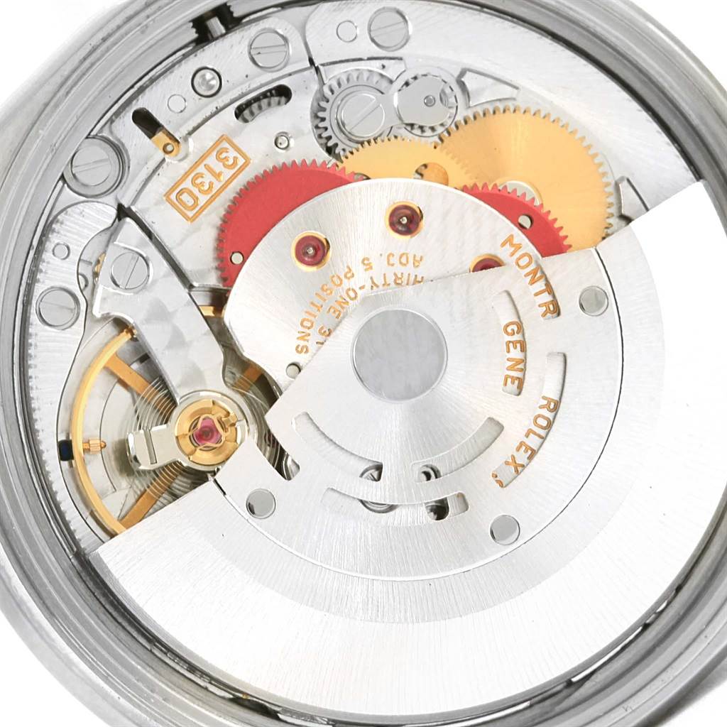This is a close-up view of the internal mechanical movement of the Rolex Air-King 14010 Stainless Steel Pink Dial 14010 Stainless Steel Pink Dial watch, showing gears and components.