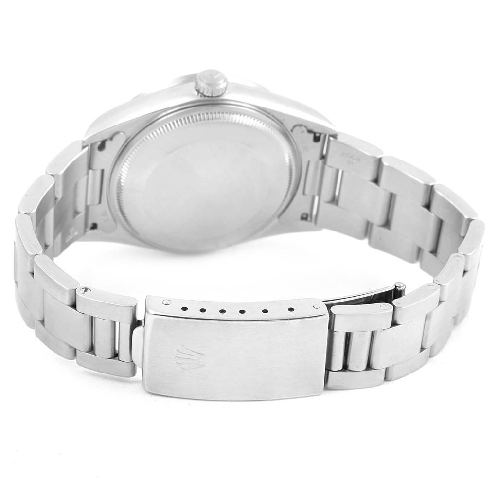 The image shows the back and clasp of a Rolex Air-King 14010 Stainless Steel Pink Dial 14010 Stainless Steel Pink Dial watch, displaying its metal bracelet and caseback from a rear angle.