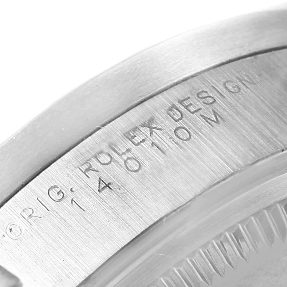 The image shows a close-up of the engraved caseback of a Rolex Air-King 14010 Men's Stainless Steel Black Dial 14010 Men's Stainless Steel Black Dial watch.