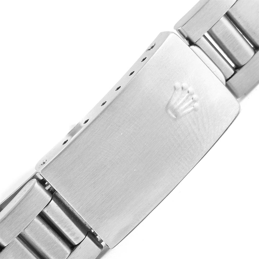 This is a close-up image showing the clasp and part of the metal bracelet of the Rolex Air-King 14010 Men's Stainless Steel Black Dial 14010 Men's Stainless Steel Black Dial watch.
