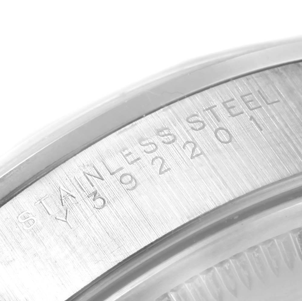 This image shows a close-up of the watch's stainless steel casing and serial number engraving on the Rolex Air-King 14000 Men's Stainless Steel Silver Dial 14000 Men's Stainless Steel Silver Dial.