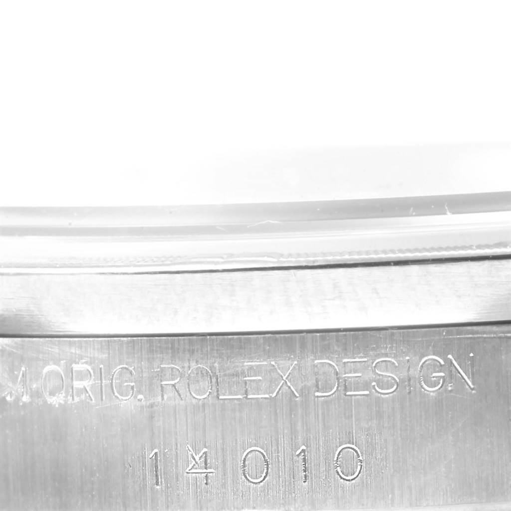The image shows a close-up of the case side of a Rolex Air-King 14010 Men's Stainless Steel Blue Dial 14010 Men's Stainless Steel Blue Dial watch, highlighting the engraved model and design number.