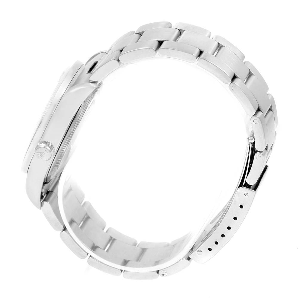 The image shows a side angle of the Rolex Air-King 14010 Men's Stainless Steel Blue Dial 14010 Men's Stainless Steel Blue Dial watch, highlighting its bracelet, clasp, and part of the case.